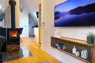 Wohn- und Esszimmer mit Kaminofen
